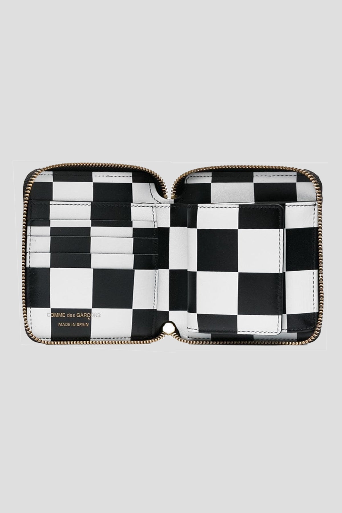 Comme des garcons 2025 zip around wallet pattern