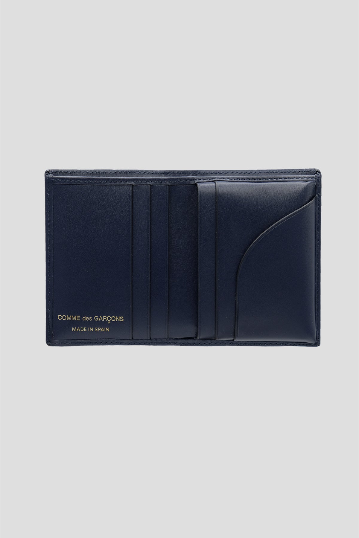 Classic Billfold Wallet SA0641 by Comme des Garçons in Navy